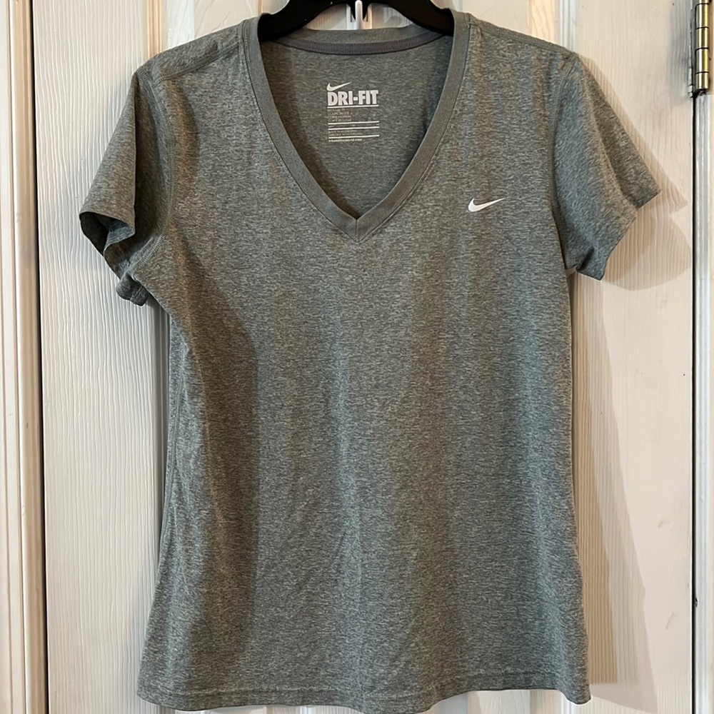 NIKE DRI-FIT athletic shirt regular fit size medium color gray. V-neck .